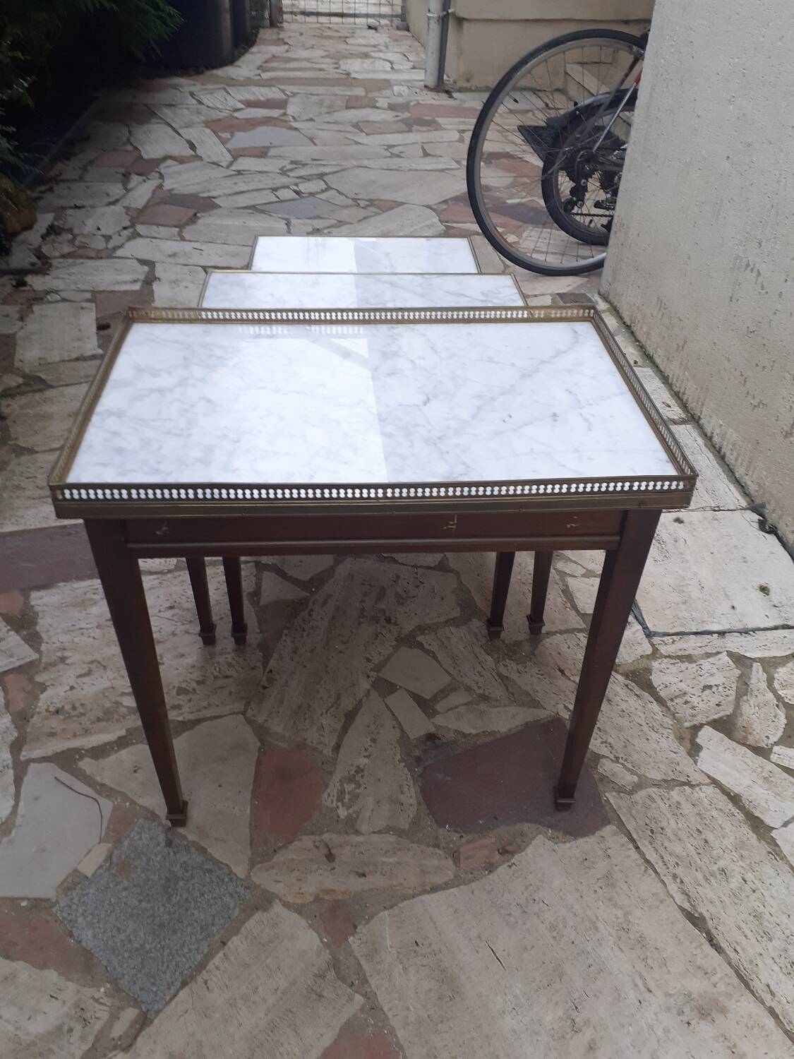 Set of three Louis XVI mahogany nesting tables