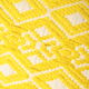 Yellow diamond knit cushion