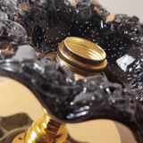 Black and gold Murano flower wall light