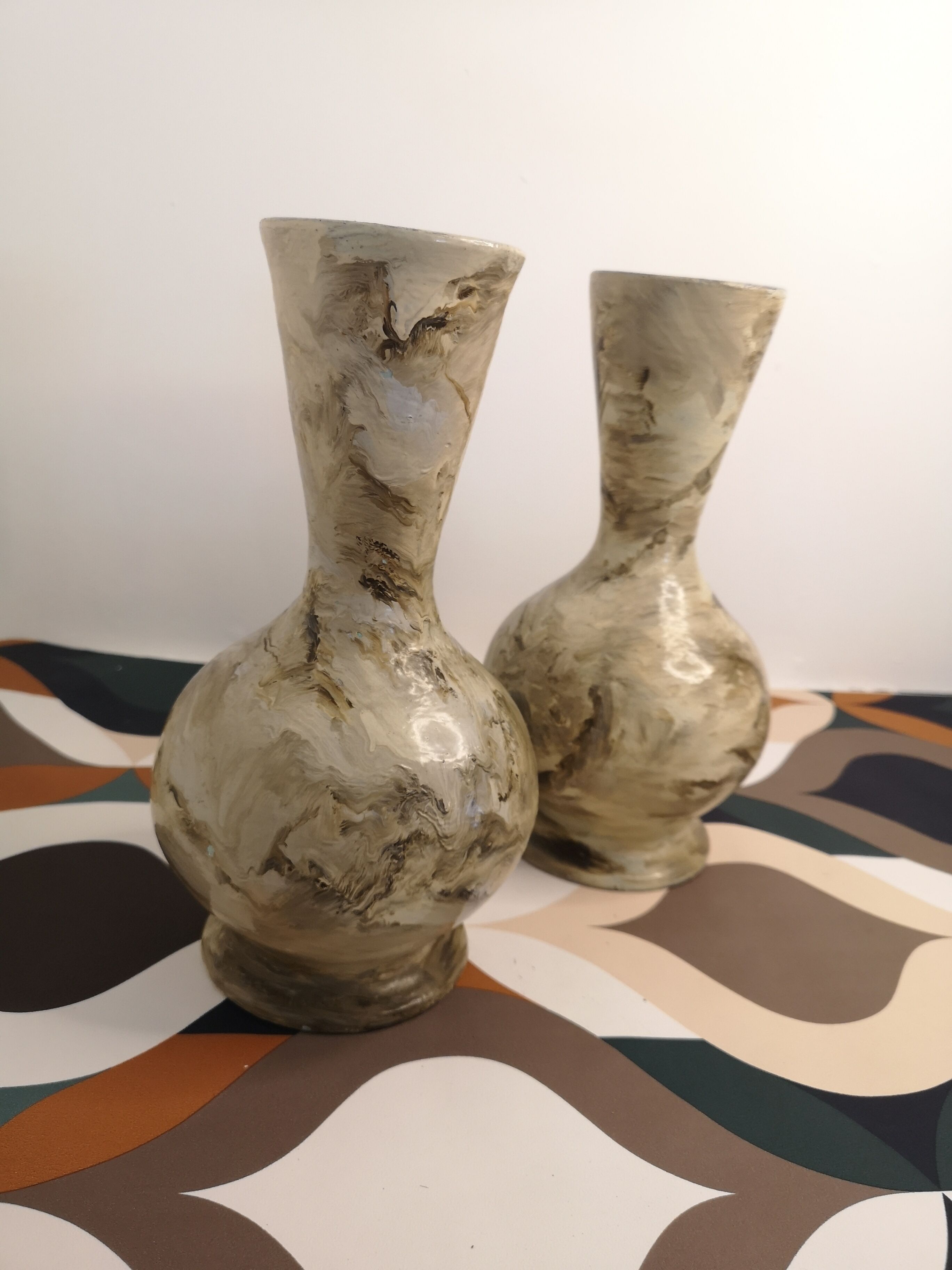 Pair of hand-painted terracotta vases