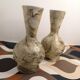 Pair of hand-painted terracotta vases