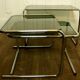 Tables in chrome metal and smoked glass 1970