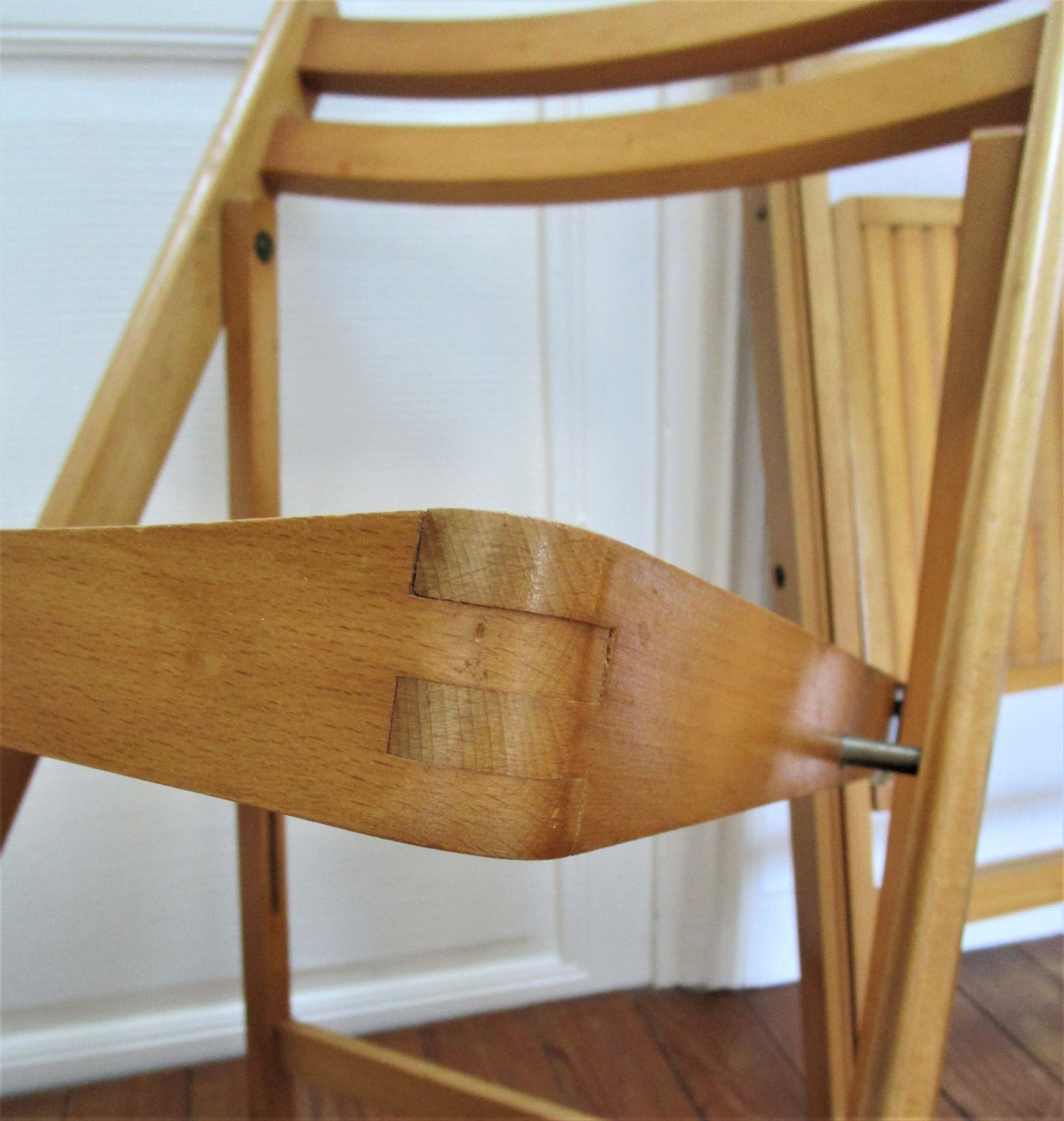Pair of folding chairs with vintage solid wood slats