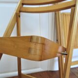 Pair of folding chairs with vintage solid wood slats