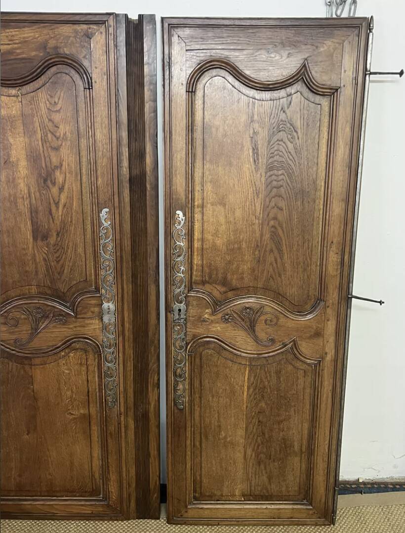 Pair of antique wardrobe doors and crosspiece