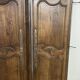 Pair of antique wardrobe doors and crosspiece