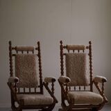 Pair of sculptural Danish modern rocking chairs in lambswool and oak, brutalist, 1950.