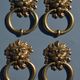 4 antique lion head furniture handles from La Samaritaine.