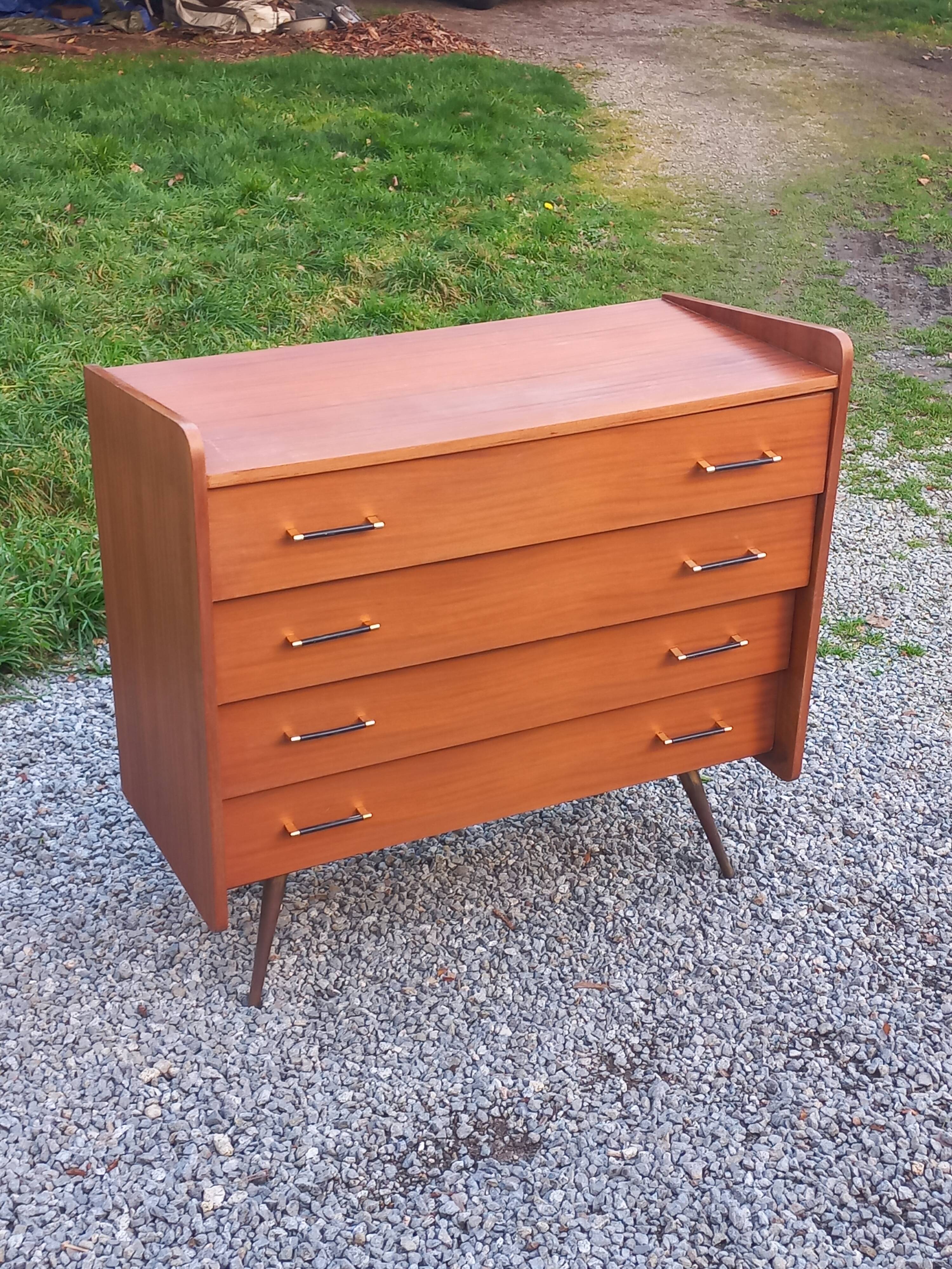 Vintage mahogany commode with metal tapered legs, 4 drawers, 1950s.
