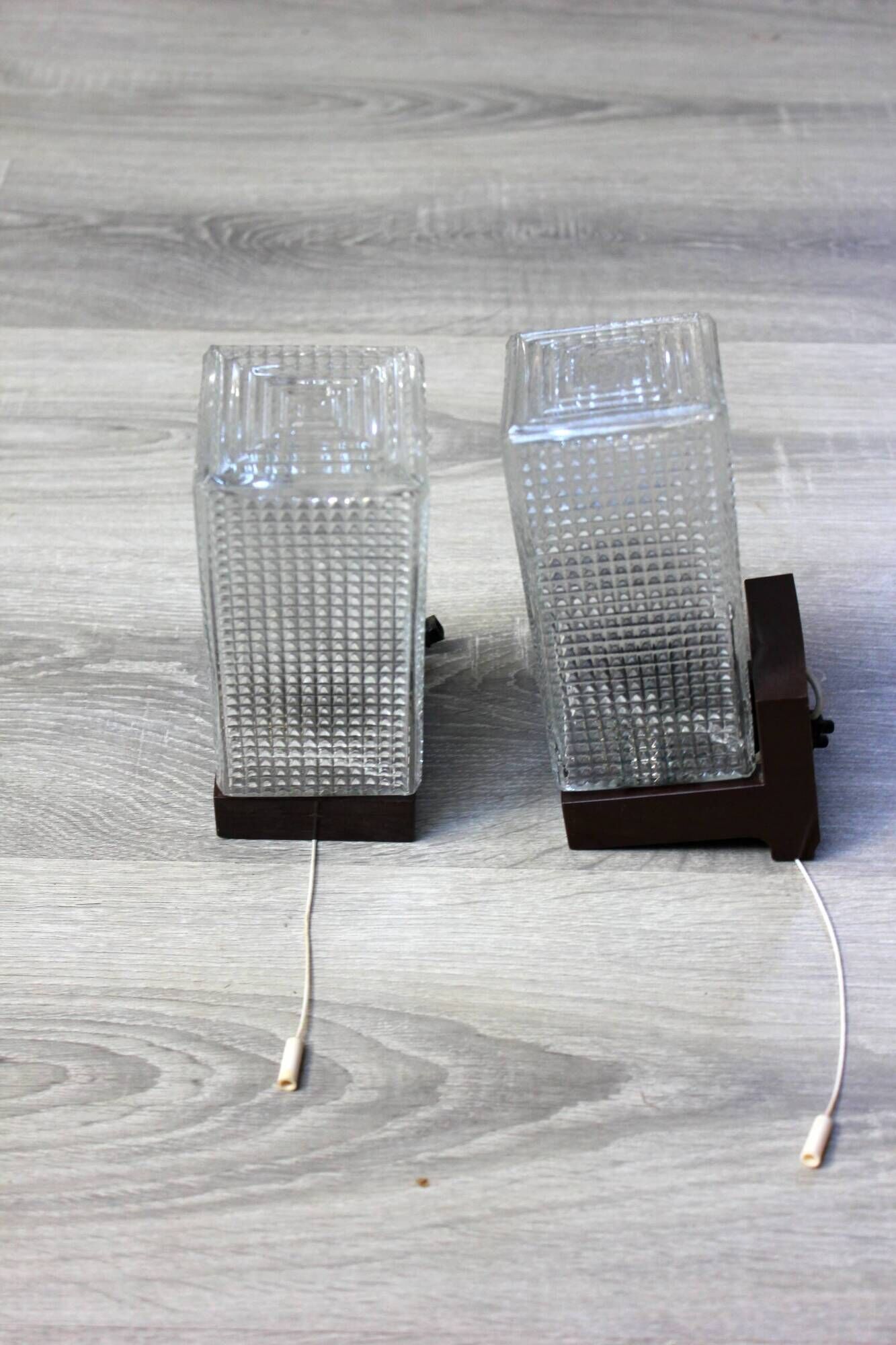 Pair of vintage wall sconces with etched glass and pull switch from the 1970s.