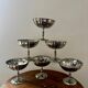 Vintage set of 6 finely engraved stainless steel bowls.