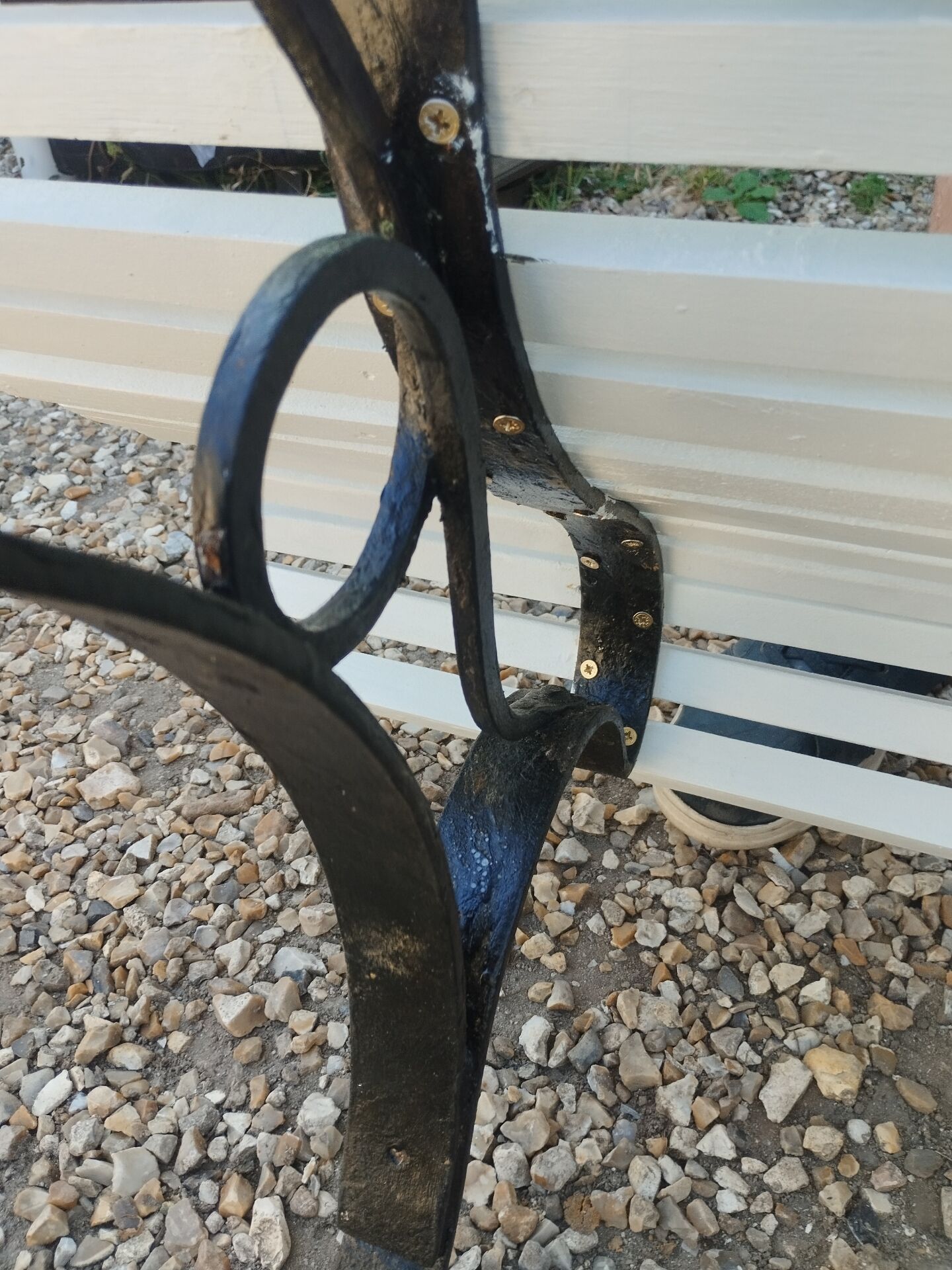 Antique garden bench with cast iron legs