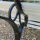 Antique garden bench with cast iron legs