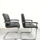Paire de fauteuils de bureau cuir et structure tubulaire chromé