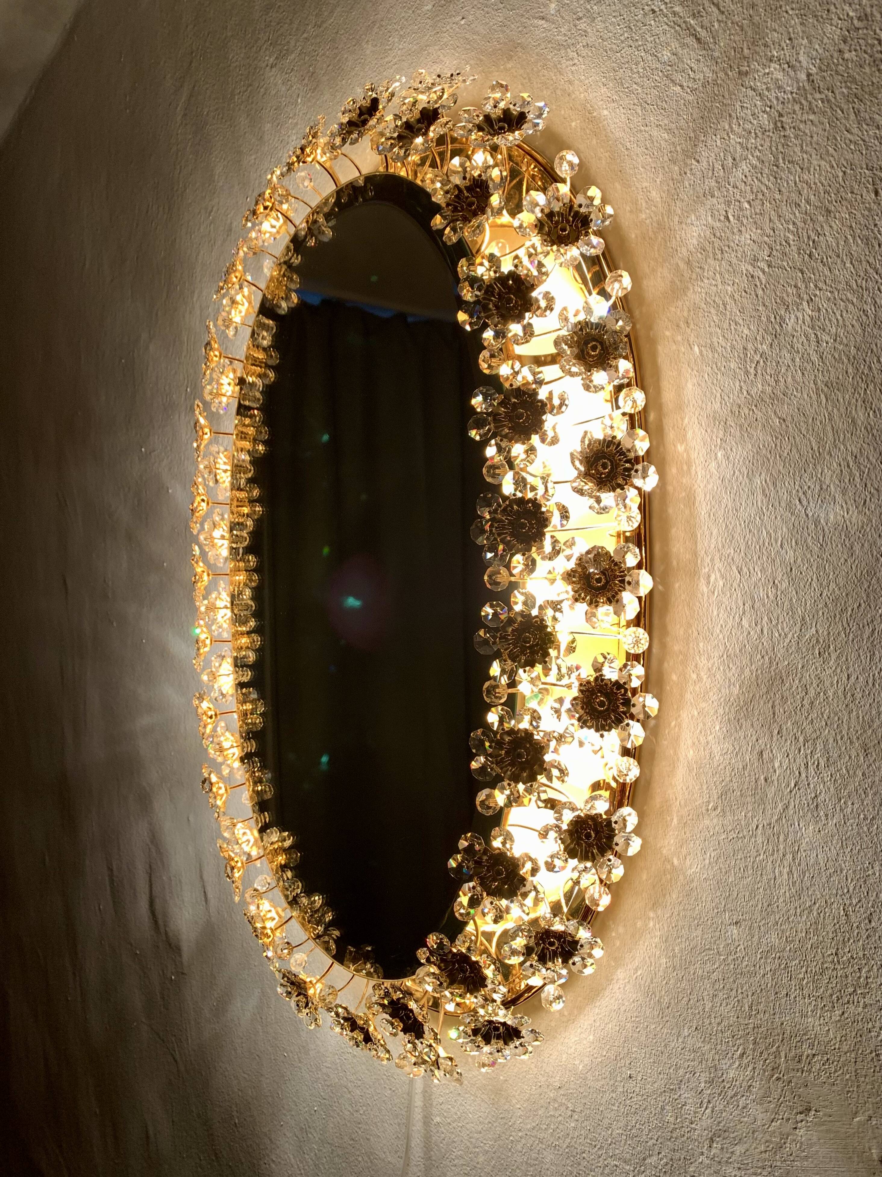 Illuminated floral mirror by Palwa
