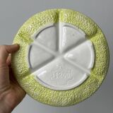 2 ceramic plates depicting a lemon