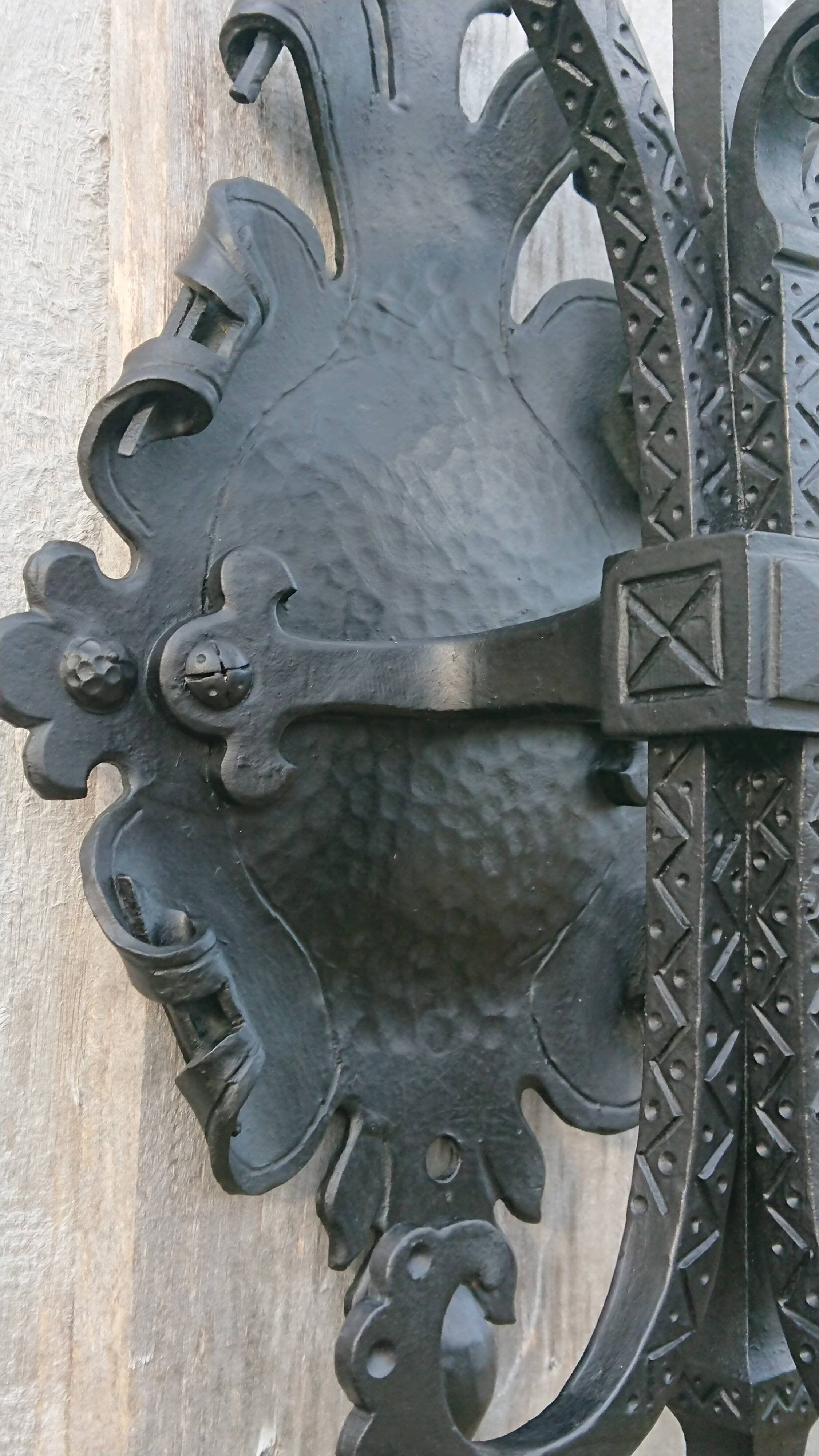 Pair of black wrought iron sconces - neo-Gothic style - from the 1950s