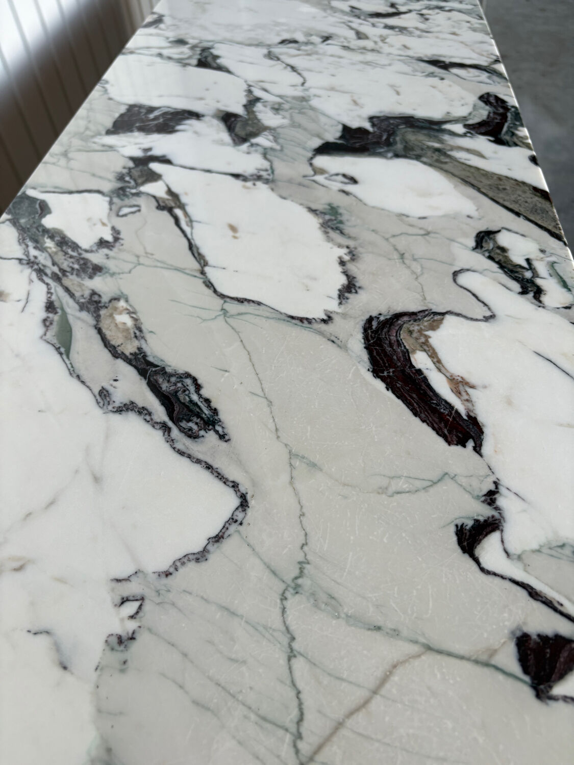 Large console in Calacatta Viola marble & solid cherry wood.