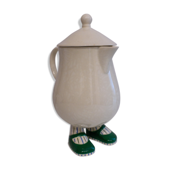 Pitcher with feet and lid