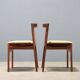 Vintage lounge chairs in exotic wood and fabric, 1960s design.