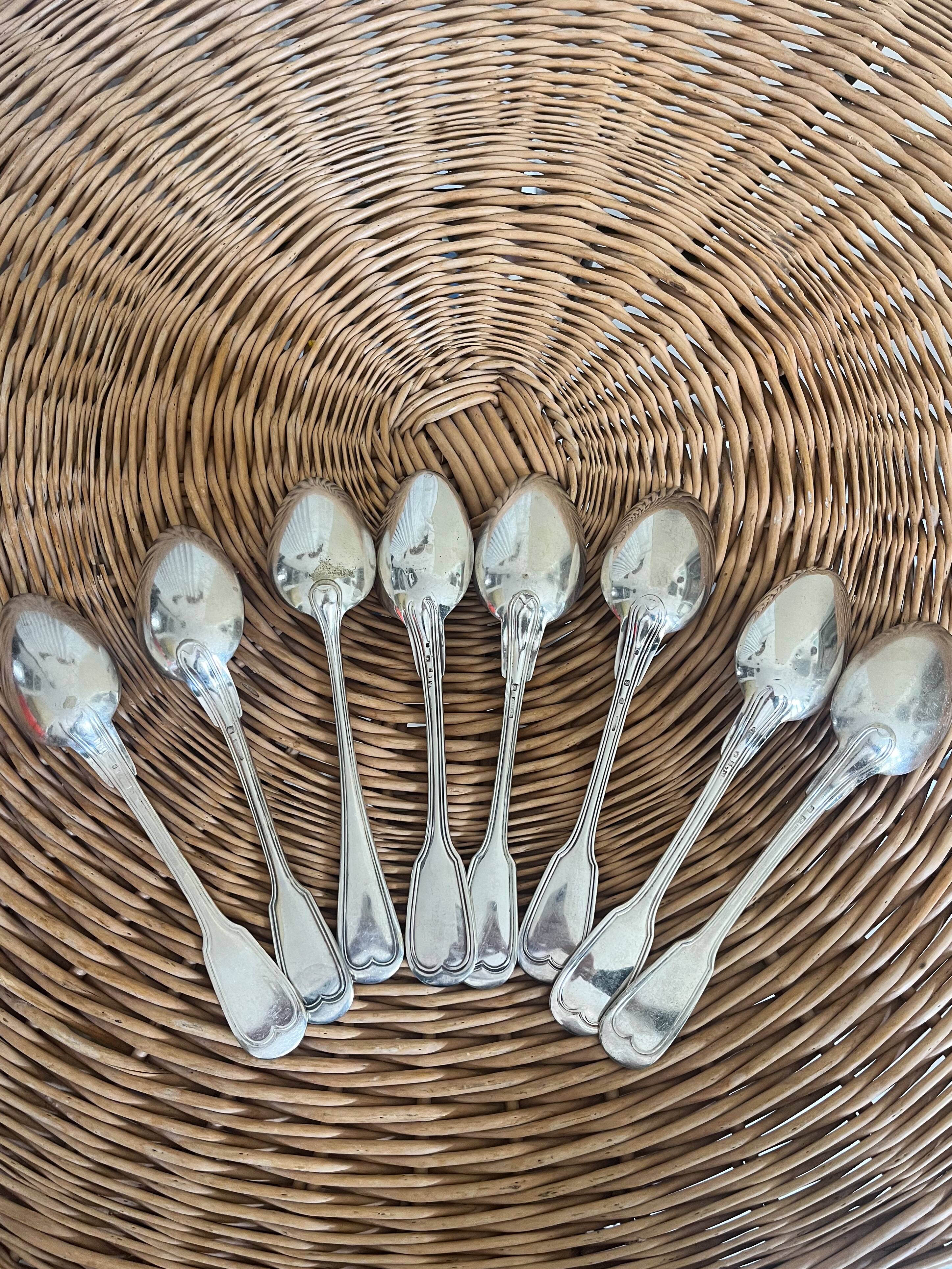 Set of 8 silver metal spoons