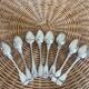 Set of 8 silver metal spoons