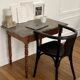 Curved black lacquered wooden armchair in Thonet style
