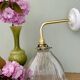 Elbow wall lamp with vintage holophane glass shade