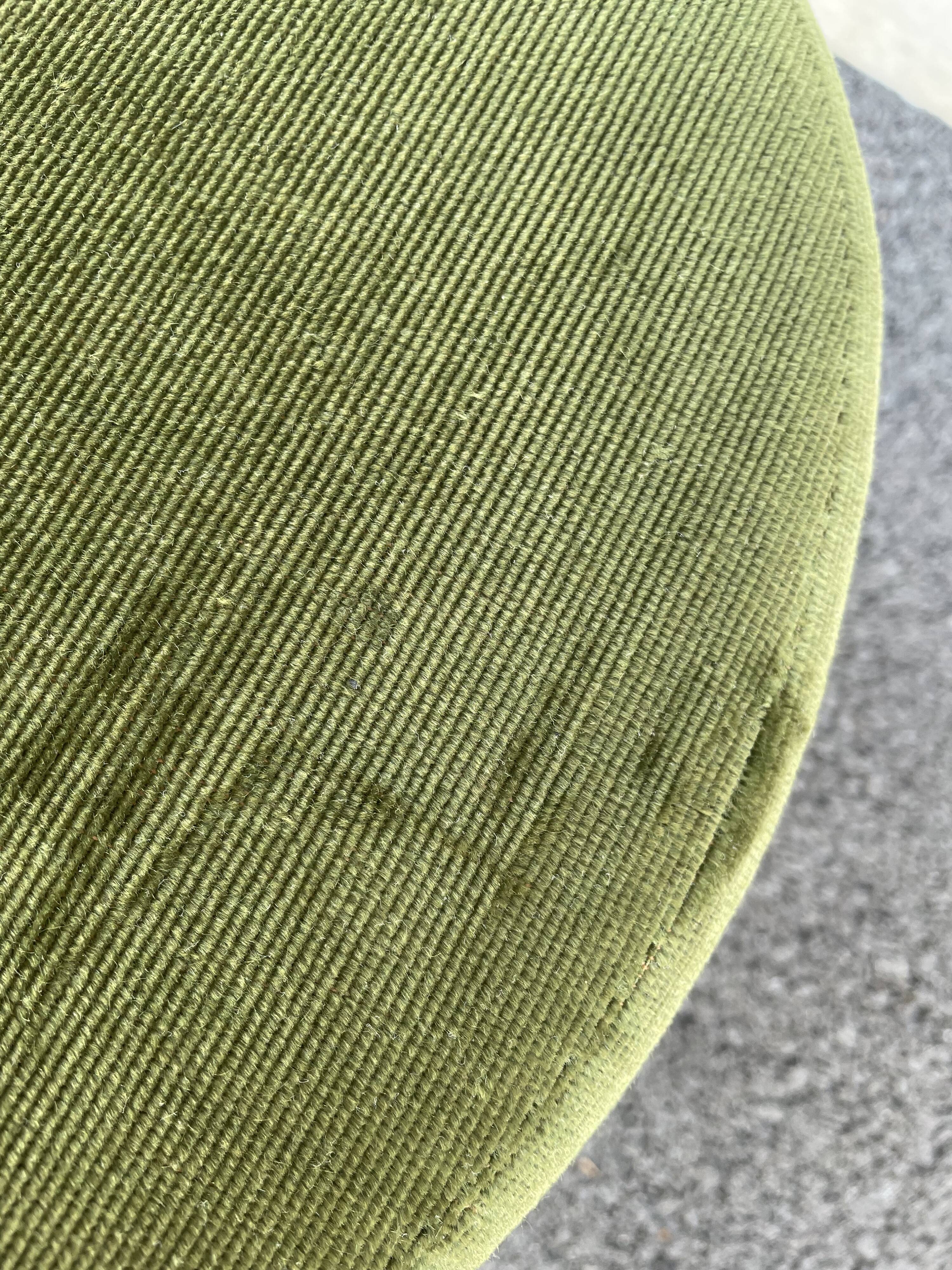 Green velvet pouf