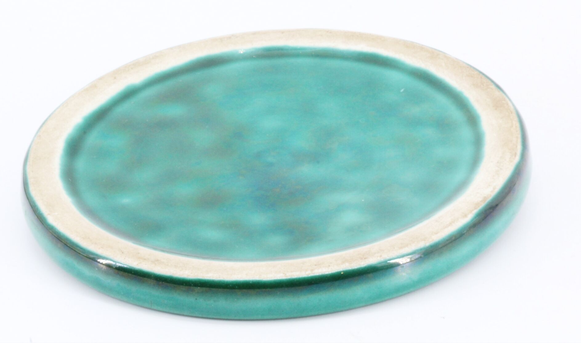 Under the plate and under ceramic bottles