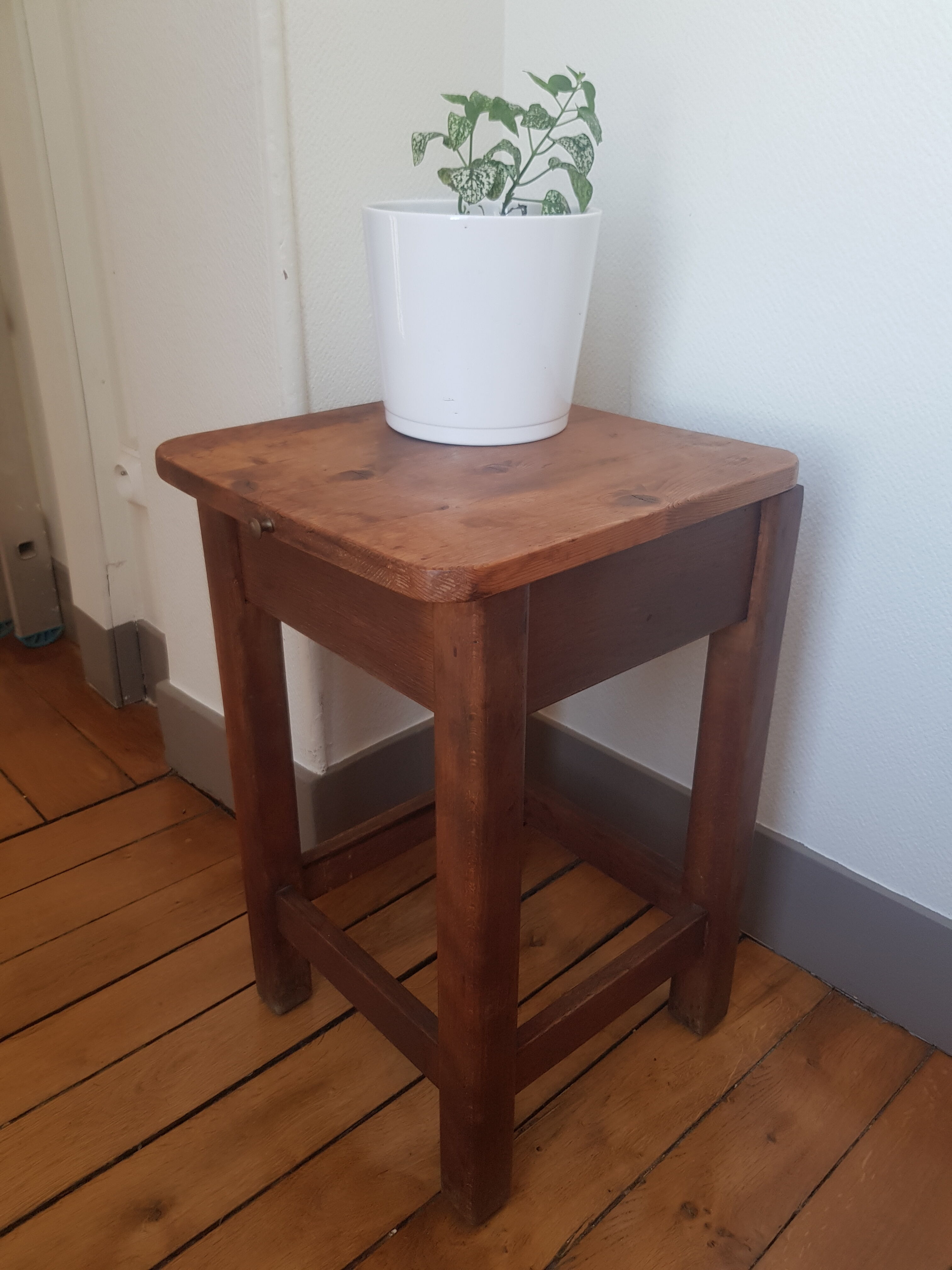 Wooden stool with chest