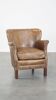 Fauteuil en cuir subtil avec coussin d'assise réversible en kilim