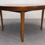 Scandinavian extendable round table in rosewood, 60s-70s