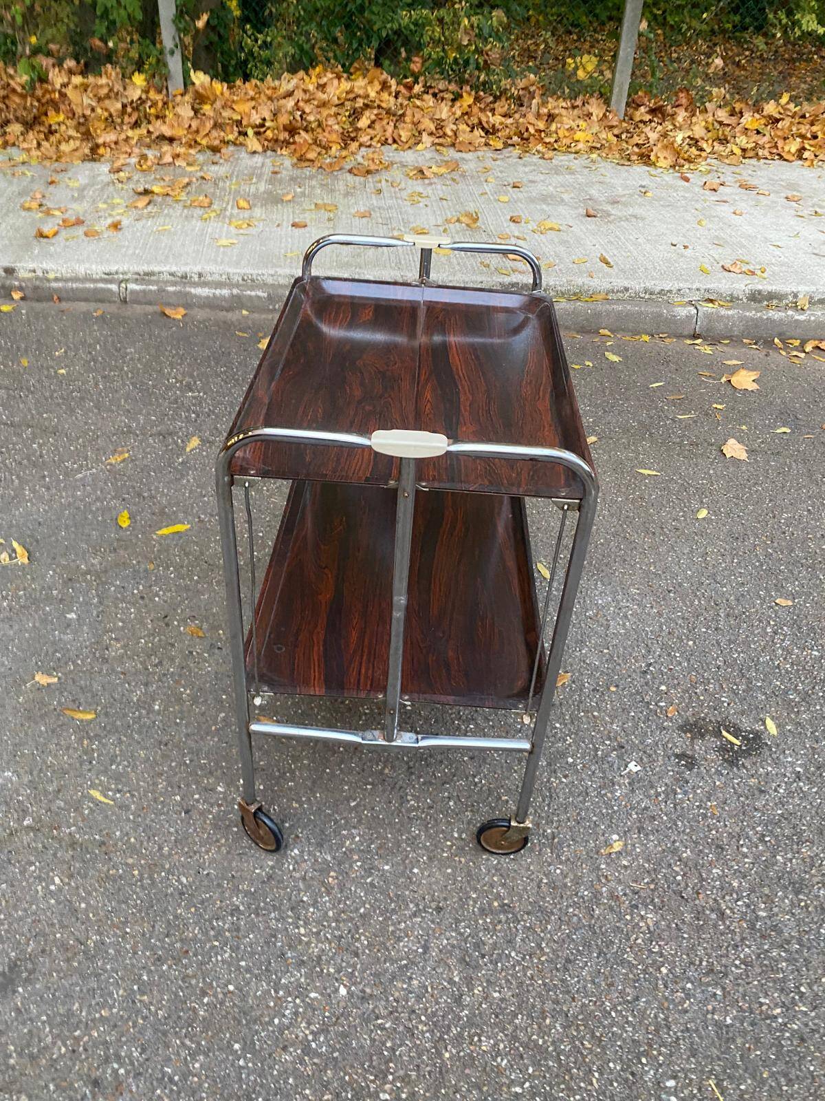 Folding serving cart in steel and mahogany wood on wheels, 70cm