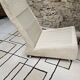 Boucle wool fireside chair and its 1970" vintage pouf