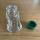 Vintage salt shaker with green Bakelite cap