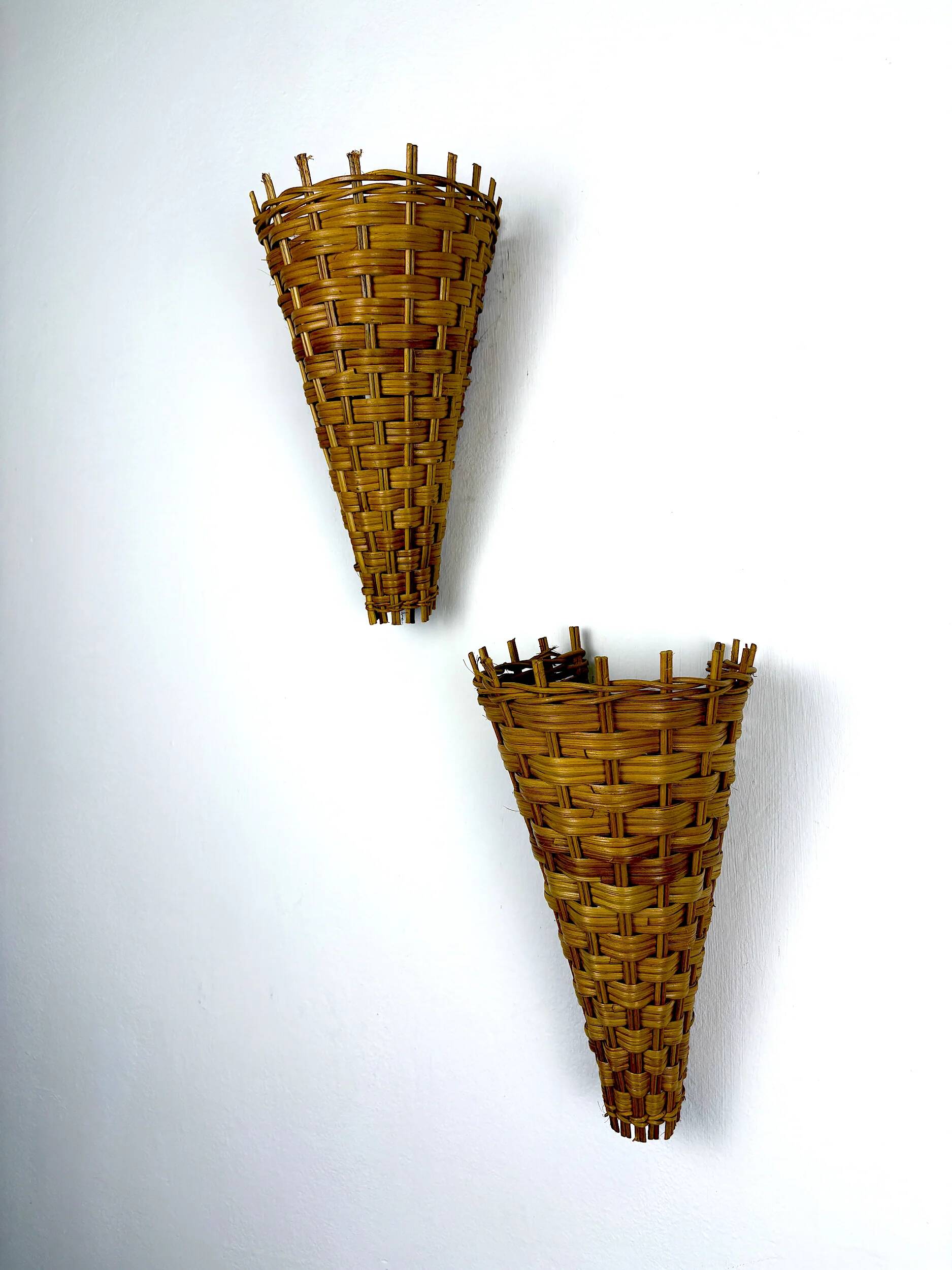 Pair of mid-century rattan wall shades, Italy, circa 1960s
