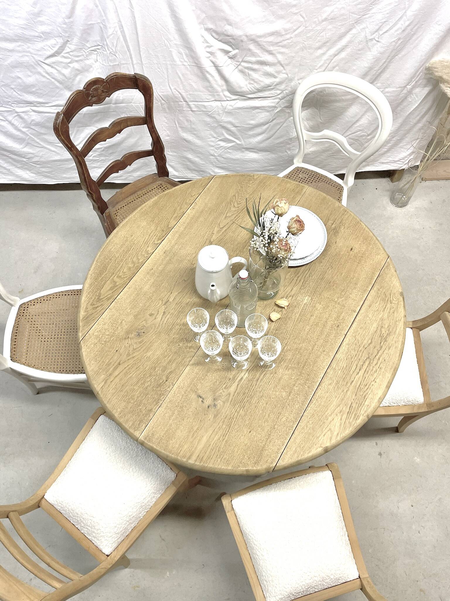restored raw oak round table from yesteryear
