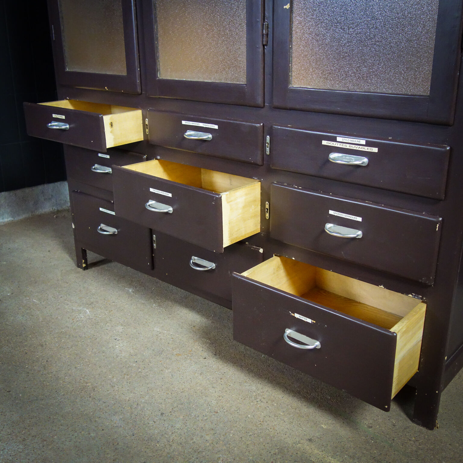 Medical display cabinet with drawers 1950