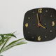 Brass and formica wall clock