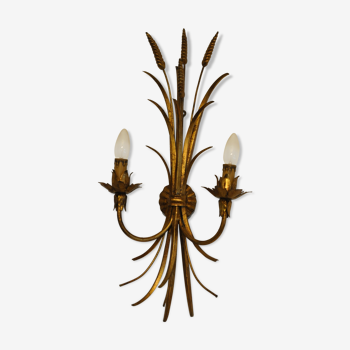 Golden metal wall sconce