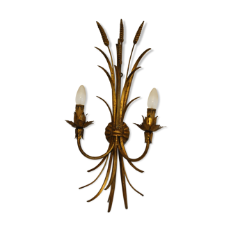 Golden metal wall sconce