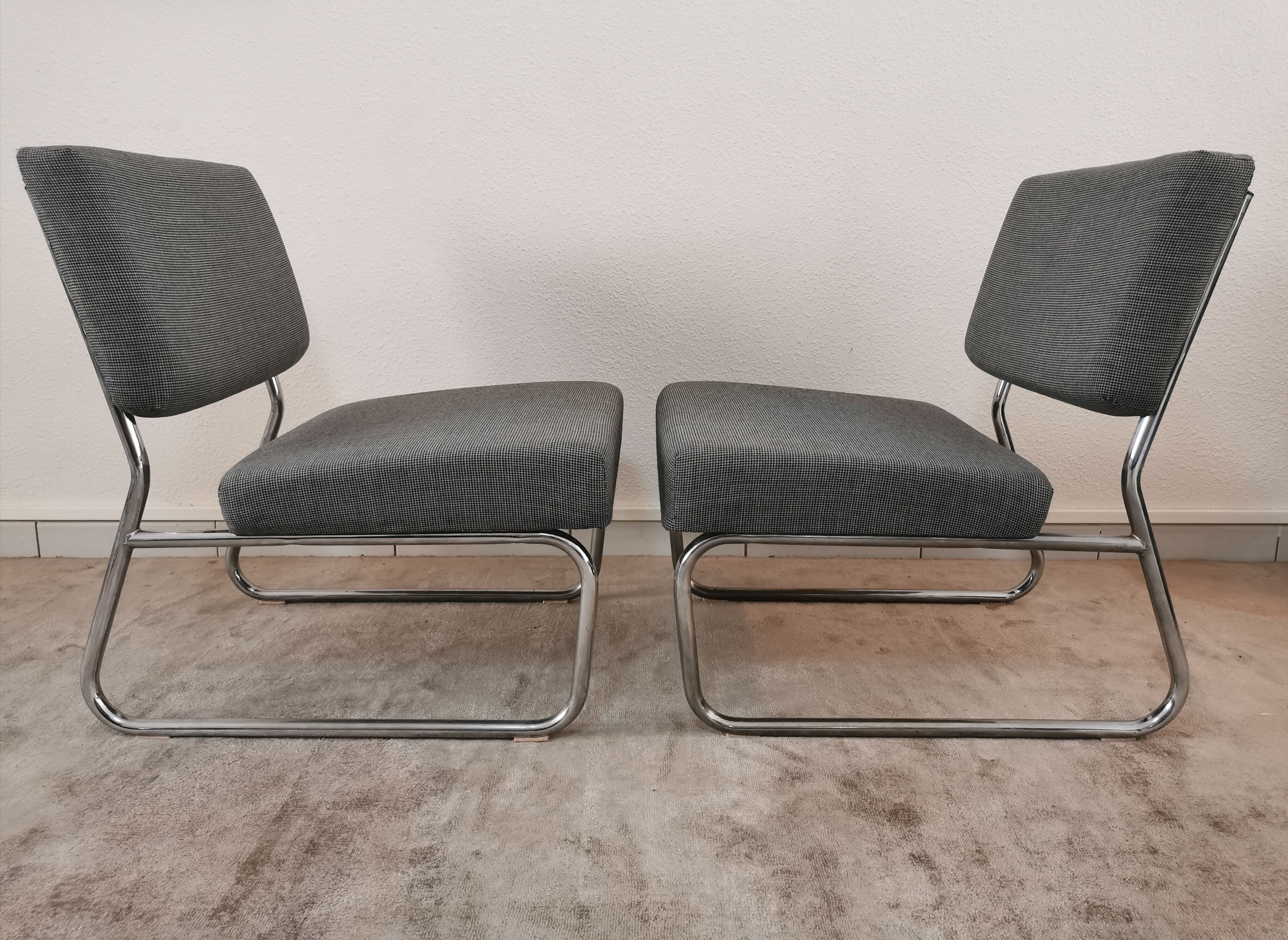 Pair of vintage chrome armchairs and "chicken foot" fabrics