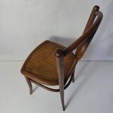 Old curved wooden bistro chair