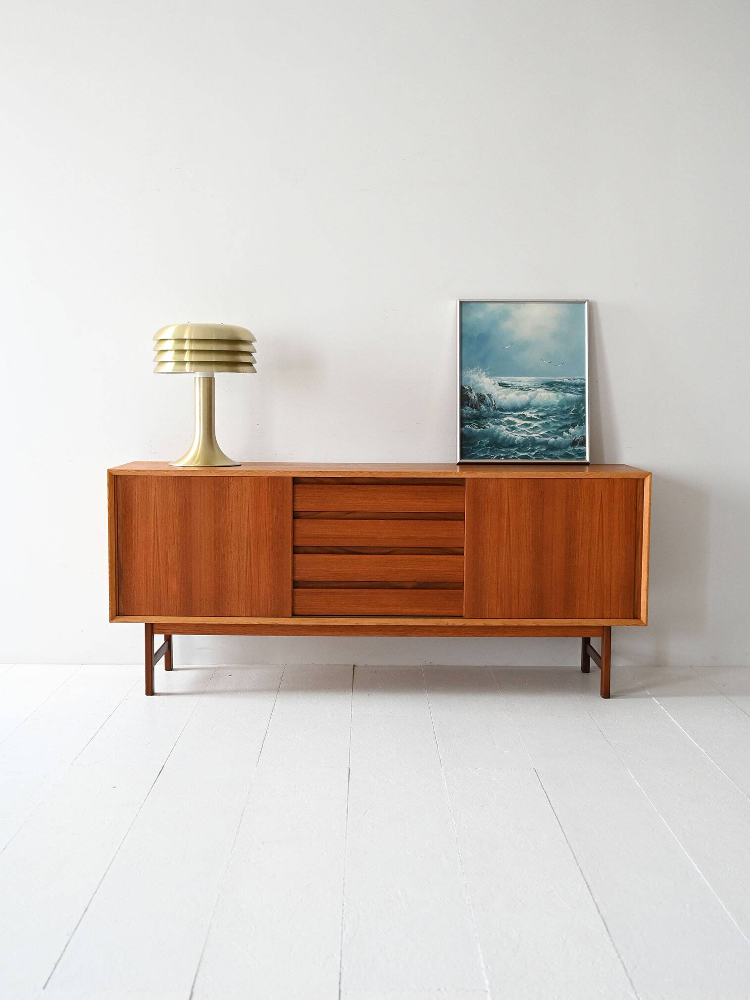 Vintage Scandinavian teak sideboard with metal-lined drawers