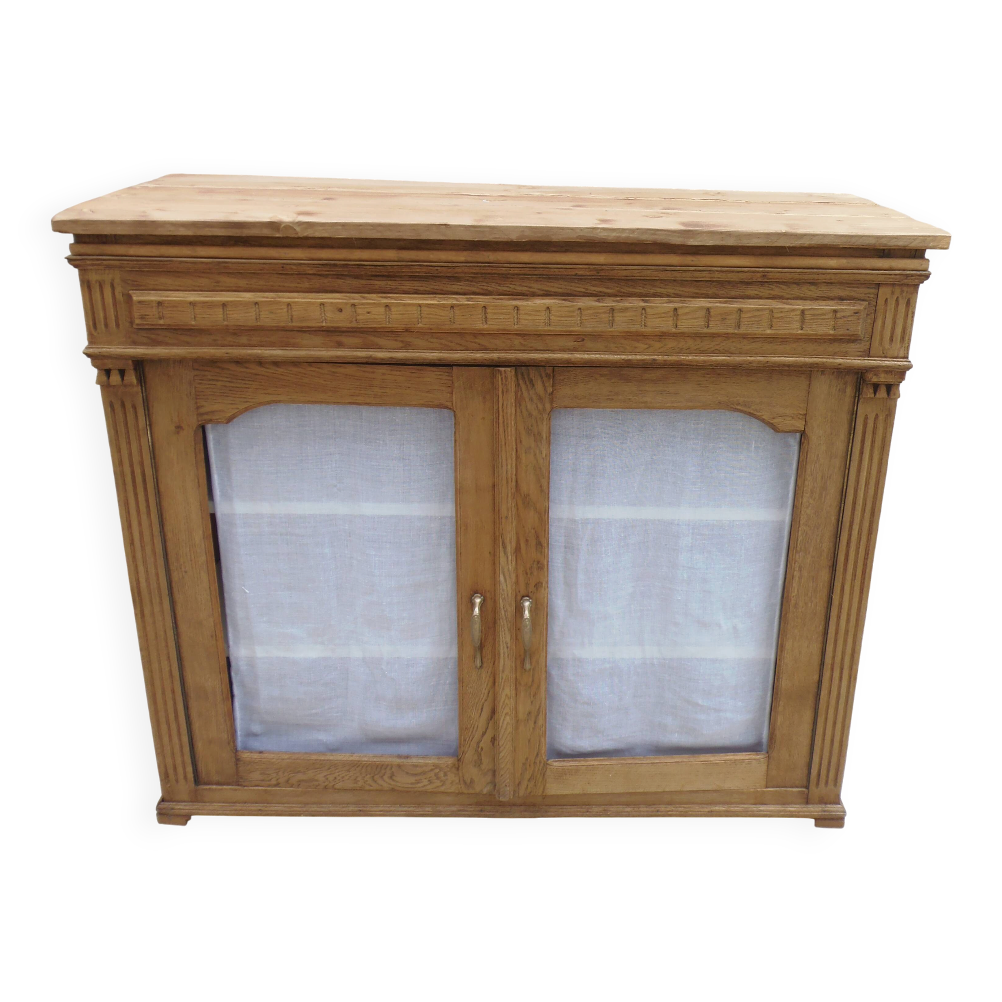 Antique wooden sideboard, fabric doors and pearl grey shelves.