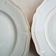 Set of 12 flat plates made of Limoges porcelain