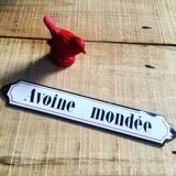 Ancient enamelplate of seed or grocery store. Furniture by trade. 1900s/1910s.