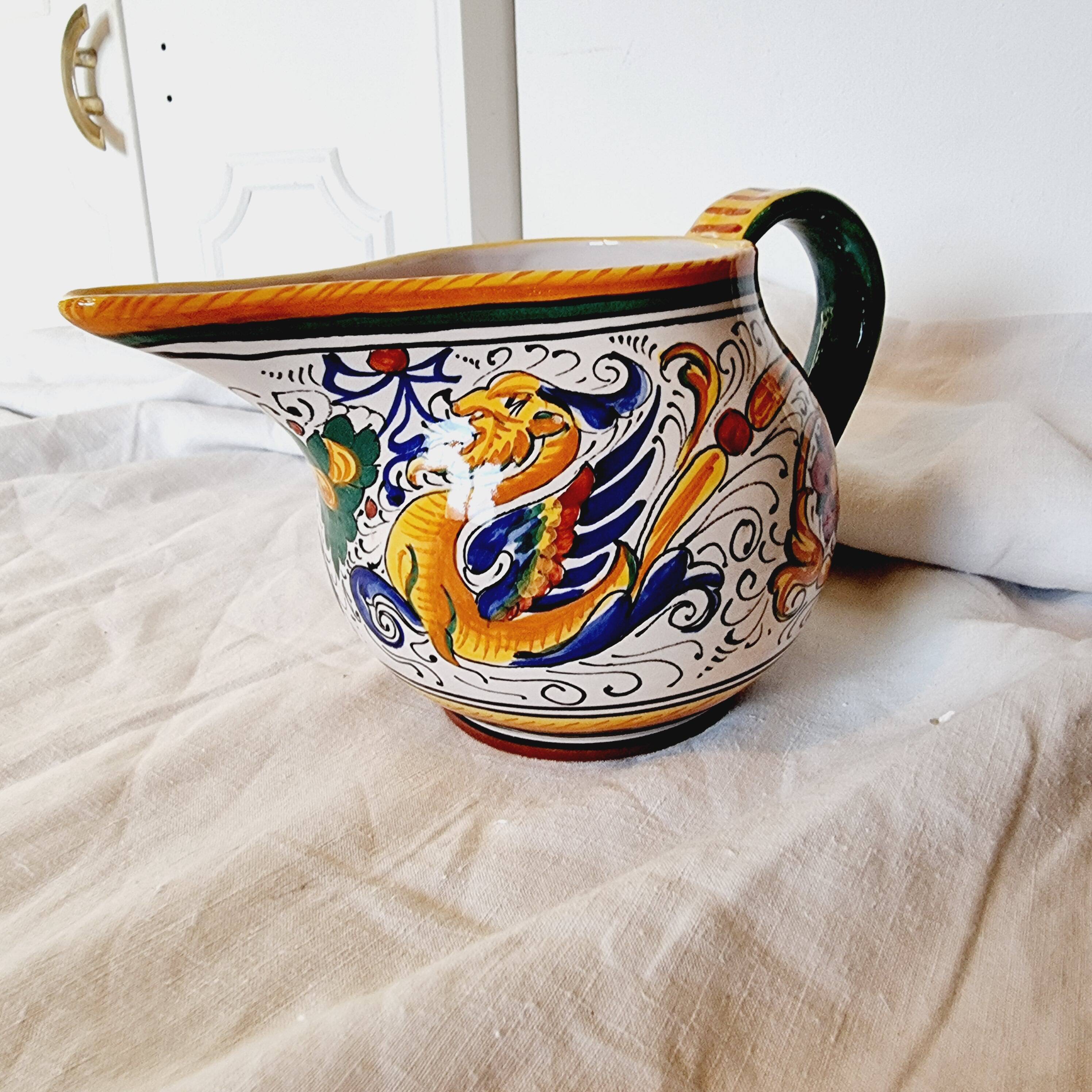 Majolica ceramic jug by R. Deruta, Italy, hand-painted, with a long spout.  Decorated with a dragon tree