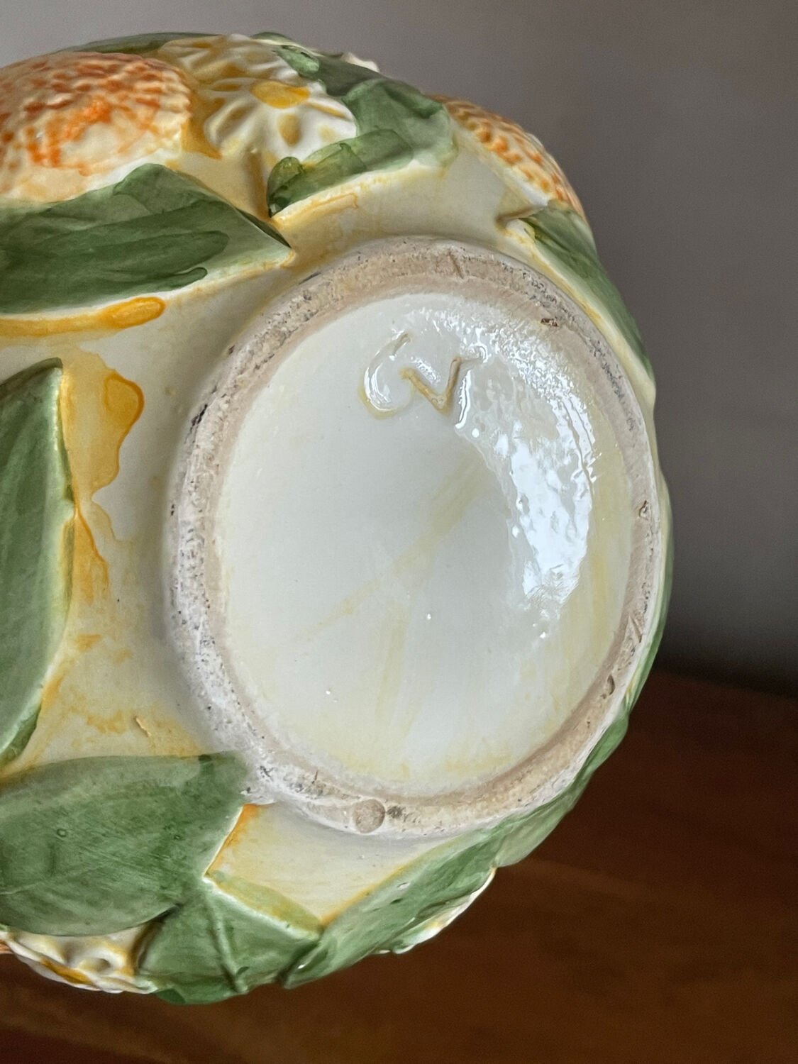 Orange slipware pitcher